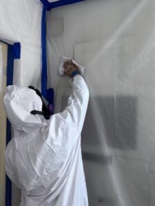 Crew wiping mold particles